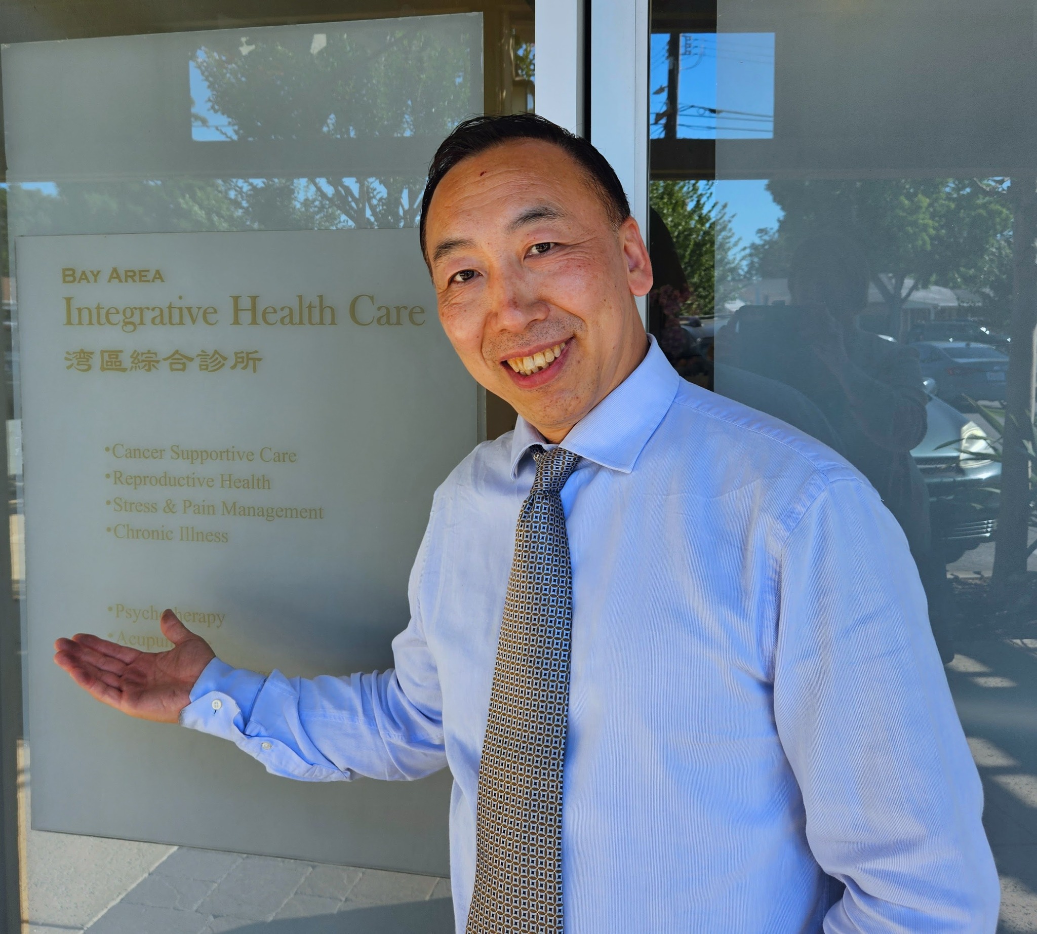 Dr. Huang outside of the Bay Area Integrative Health Care clinic.