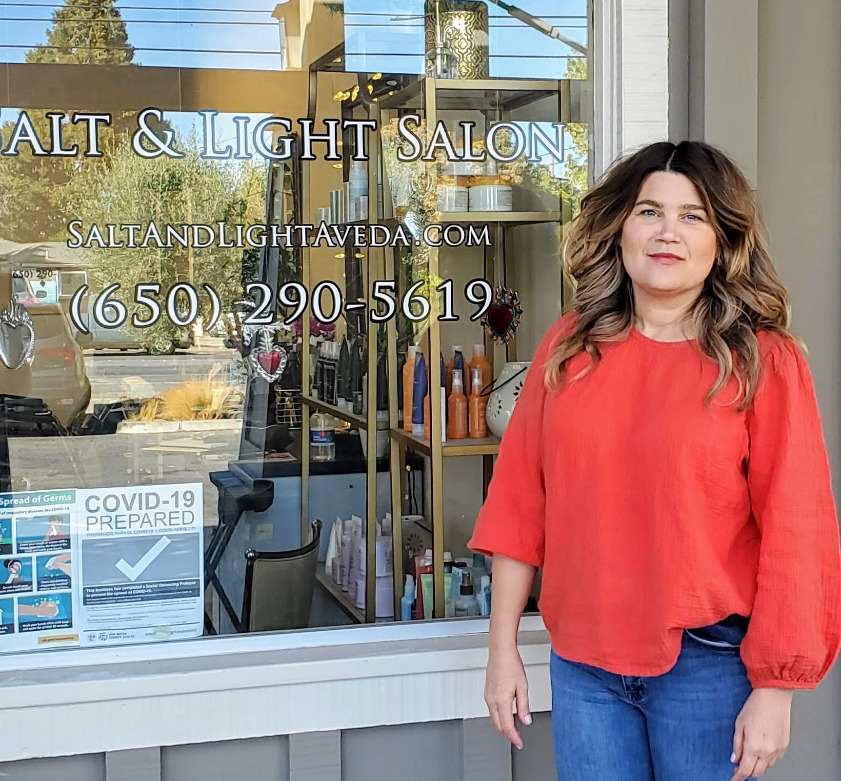 A Salt & Light stylist outside of the salon.