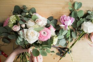 An assortment of roses on a table.