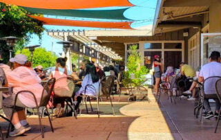 Various groups of people gathered on the Patio.