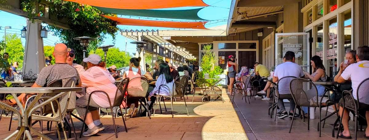 Various groups of people gathered on the Patio.