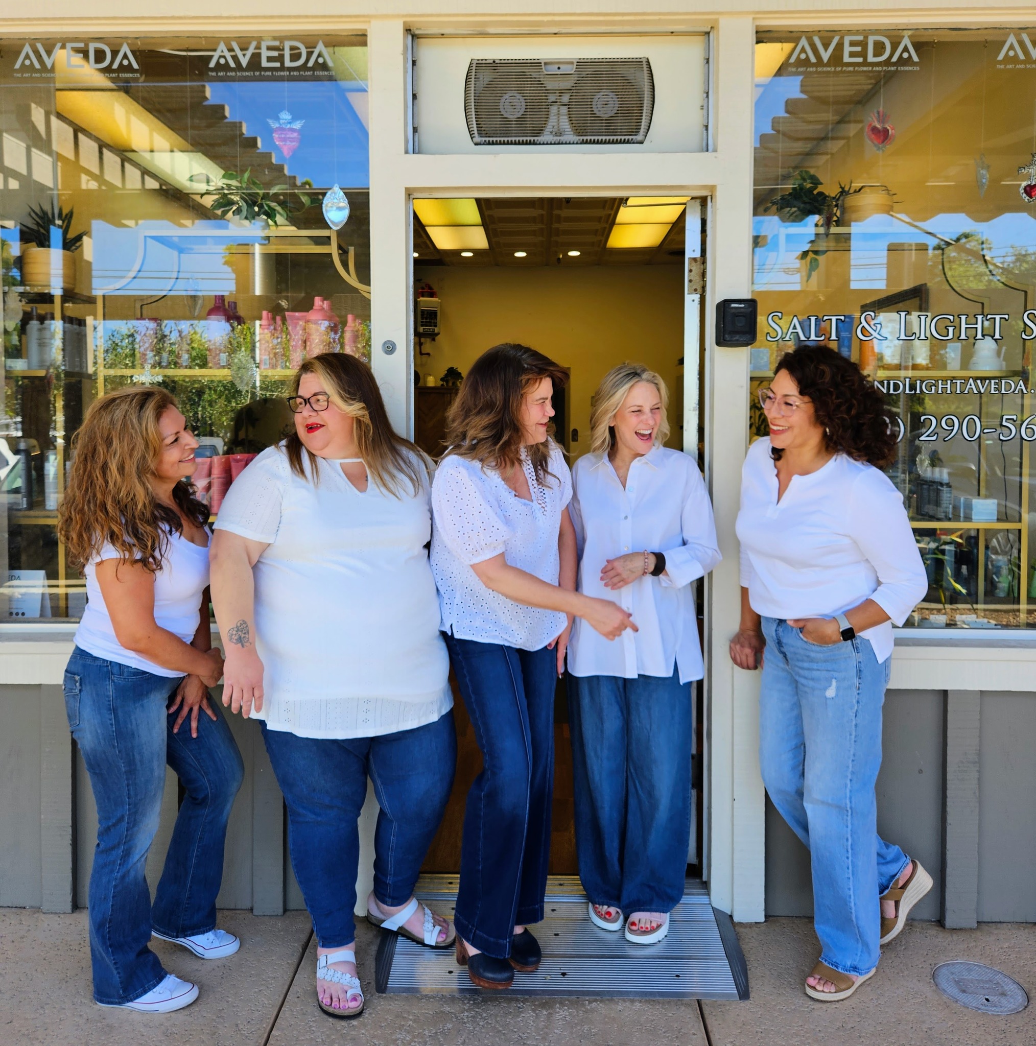 The Salt and Light stylists outside of the salon.